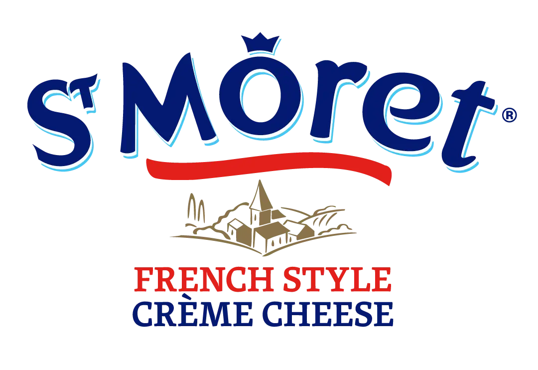 St Moret French Style Creme Cheese logo with crown, red banner, and traditional French village illustration.